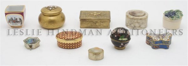 A Collection of Seventeen Pill Boxes, Width of largest : A Collection of Seventeen Pill Boxes, of various forms and materials including silver, porcelain and enameled examples. Width of largest 3 1/2 inches.