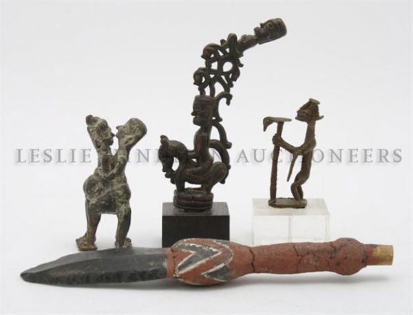 A Collection of Ethnographic Articles, Height of the fi: A Collection of Ethnographic Articles, comprising African pierce carved figures riding a horse, a couple in an embrace, together with another figure and a flint dagger. Height of the first overall 7 1