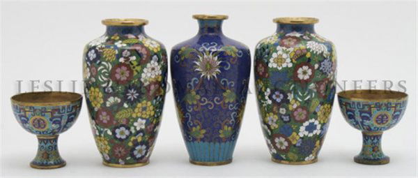 A Collection of Five Chinese Cloisonne Articles, Height: A Collection of Five Chinese Cloisonne Articles, comprising three vases and two footed cups, each with floral decoration. Height of tallest 6 1/4 inches. Property from the Collection of Mr. Peter Lind