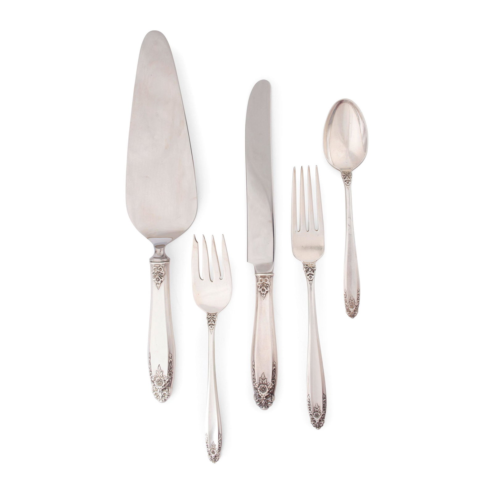 A International Silver Service for Eight in the Prelude: A International Silver Service for Eight in the Prelude Pattern including eight knives with stainless blades and a server, eight dinner forks, eight teaspoons and eight salad forks. 29 ozt 12 dwt. Len