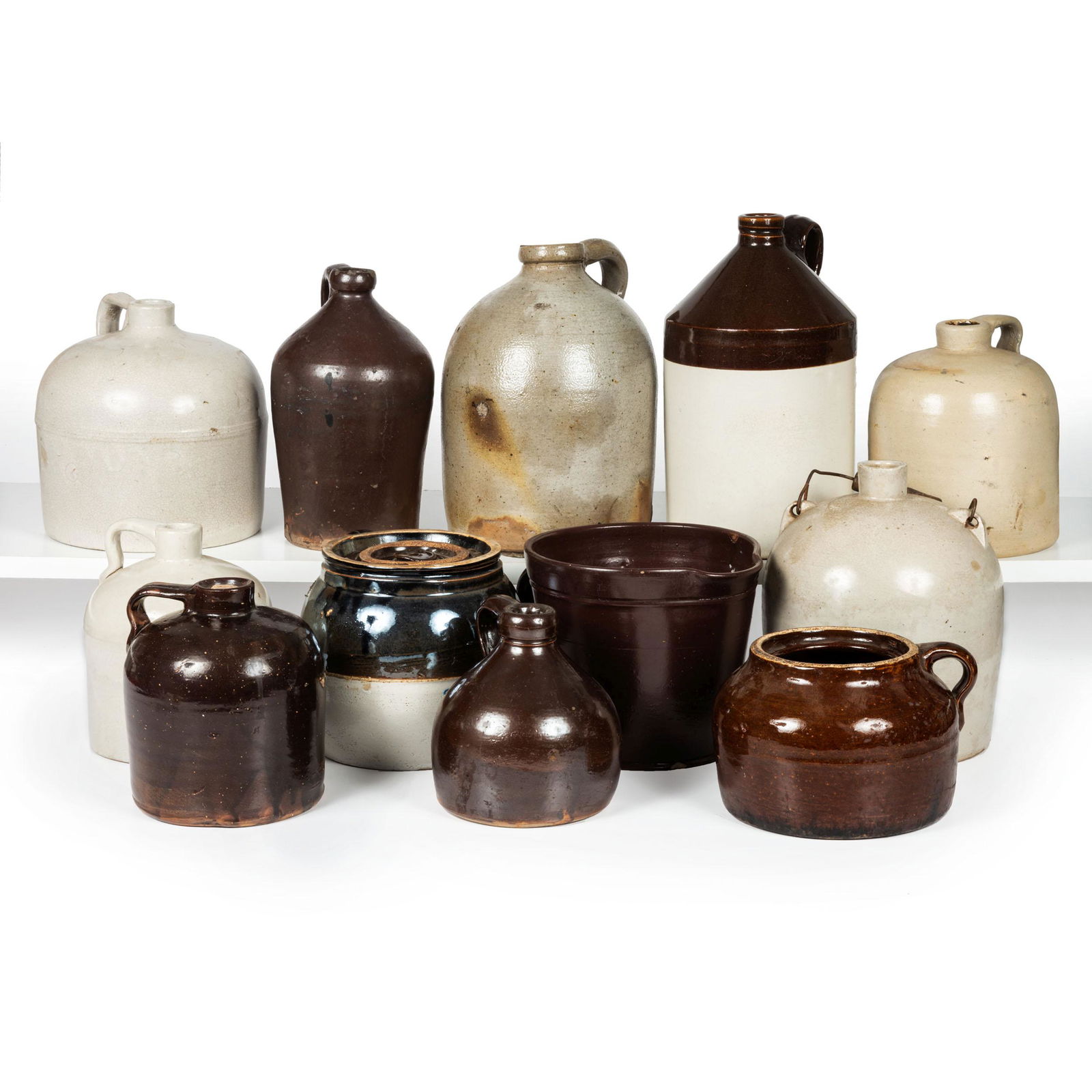 Twelve Stoneware Jugs and Pitchers (1 of 2)