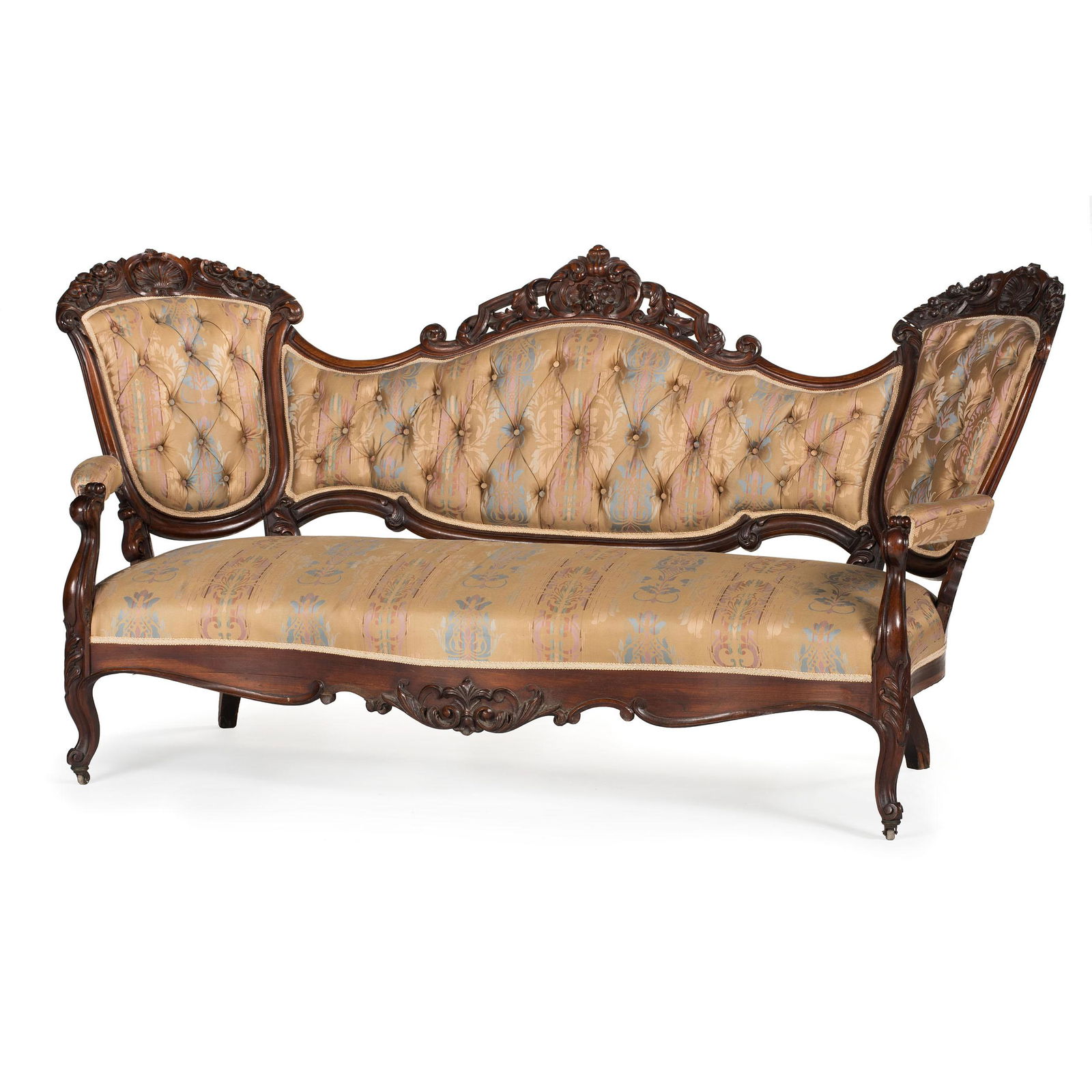 A Pair of Renaissance Revival Carved Walnut Settees: A Pair of Renaissance Revival Carved Walnut Settees Likely Continental, 19th Century Height of each 40 3/4 x length 85 x depth 27 inches. Property from the Estate of Elizabeth Austin Hammon