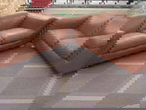 PAIR OF CONTEMPORARY CARAMEL LEATHER UPHOLSTERED: PAIR OF CONTEMPORARY CARAMEL LEATHER UPHOLSTERED SETTEES L:65""