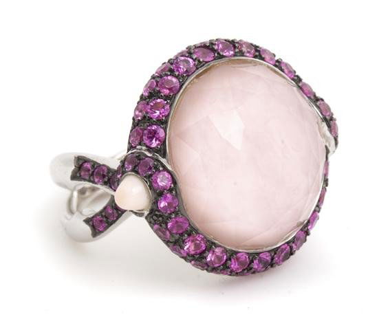 An 18 Karat White Gold, Rock Crystal, Pink Opal and Pin: An 18 Karat White Gold, Rock Crystal, Pink Opal and Pink Sapphire Ring, Stephen Webster, containing a round checkerboard top rock crystal quartz measuring approximately 17.75 mm in diameter with pink