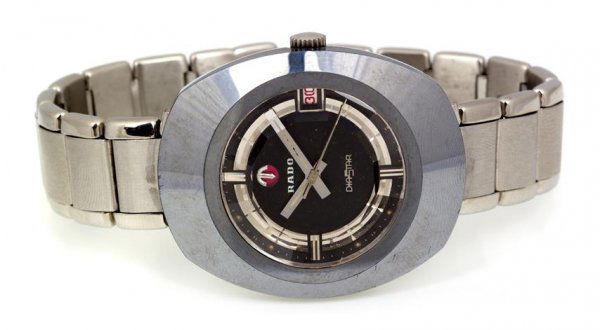 A Stainless Steel Diastar" Mechanical Watch, Rado,": A Stainless Steel "Diastar" Mechanical Watch, Rado, matte black dial, silvered baton hands, date aperture, faceted crystal, screw on case back, steel elastic bracelet. Case back stamp: RADO WATER SEAL