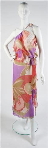 A Stephen Burrows Floral Print Dress,: A Stephen Burrows Floral Print Dress, 1970s, with a halter neckline, ruffle trim cascading down the dress. Labeled: Stephen Burrows.