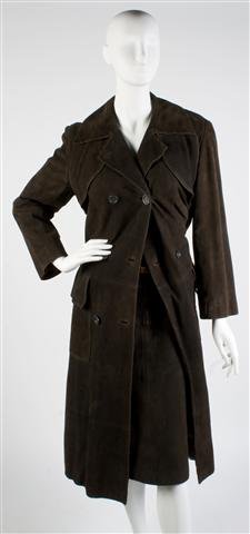 An Hermes Brown Suede Trench Coat and Matching Skirt,: An Hermes Brown Suede Trench Coat and Matching Skirt, 1960s, coat with sheep's wool lining, skirt with a buckle detail at front. A-line fit. Labeled: Hermes Sport.