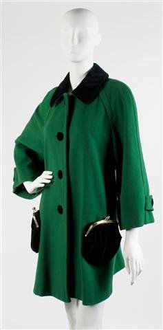 A Moschino Green 'Coin Purse' Coat, Size 10.: A Moschino Green 'Coin Purse' Coat, in a swing fit with two detachable velvet coin purse pockets. Labeled Moschino Cheap and Chic. Size 10.