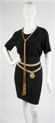 A Moschino 'Cartoon Couture' Ensemble,: A Moschino 'Cartoon Couture' Ensemble, comprised of a blouse and skirt. Labeled: Moschino Couture!