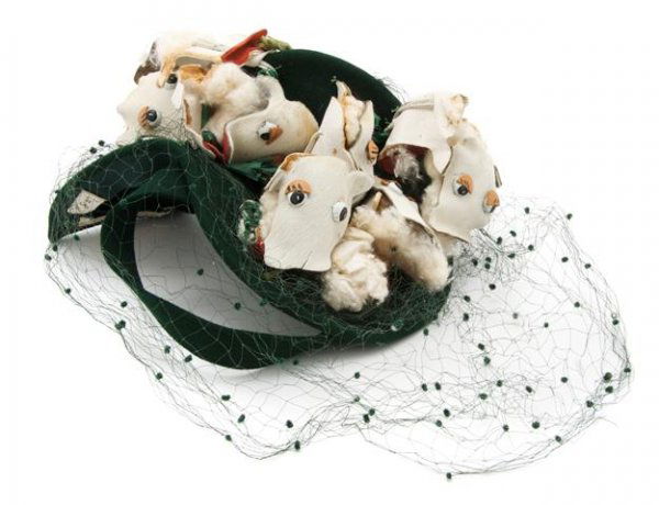 A Bes-Ben Dark Green Felt Cow Hat,: A Bes-Ben Dark Green Felt Cow Hat, with all-over cow faces, with green netting. Labeled: Bes-Ben. Property from the Estate of Norma Seidman, Lincolnwood, Illinois