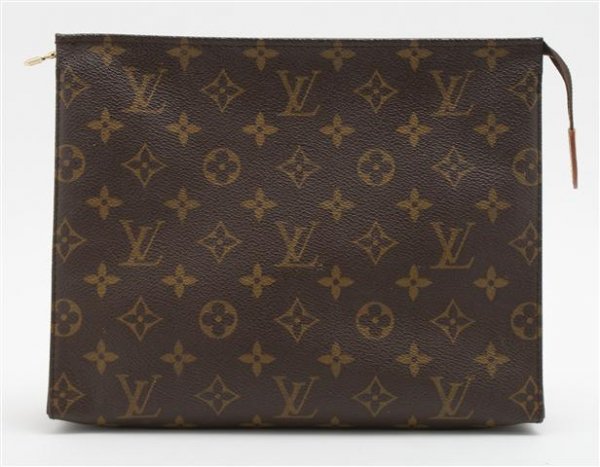 A Louis Vuitton Monogram Canvas Zippered Make-Up Case. : A Louis Vuitton Monogram Canvas Zippered Make-Up Case. Stamped: Louis Vuitton. 9 1/2 x 7 inches. Property of Julie Heidt, Chicago, Illinois