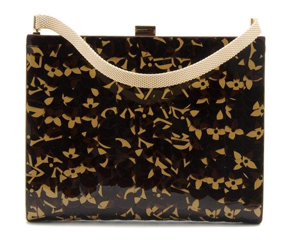 A Louis Vuitton Monogram Paillettes Evening Bag, 7 x 5 : A Louis Vuitton Monogram Paillettes Evening Bag, with a gold chain handle. Stamped: Louis Vuitton. 7 x 5 inches. Property of Julie Heidt, Chicago, Illinois