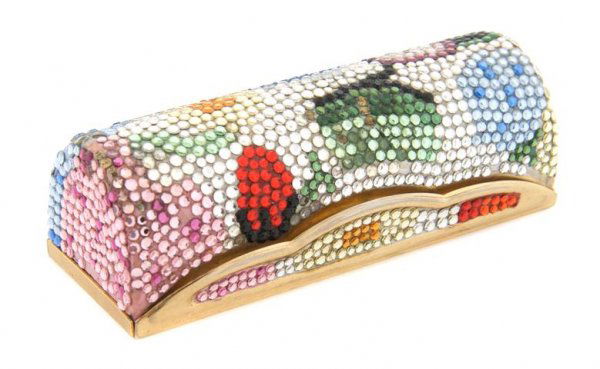 A Judith Leiber Rhinestone Lipstick Case,: A Judith Leiber Rhinestone Lipstick Case, in a floral motif. Stamped: Judith Leiber. Property from the Estate of Norma Seidman, Lincolnwood, Illinois