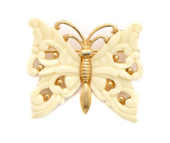 A Hattie Carnegie Faux Ivory Butterfly Brooch.: A Hattie Carnegie Faux Ivory Butterfly Brooch. Stamped: Hattie Carnegie.
