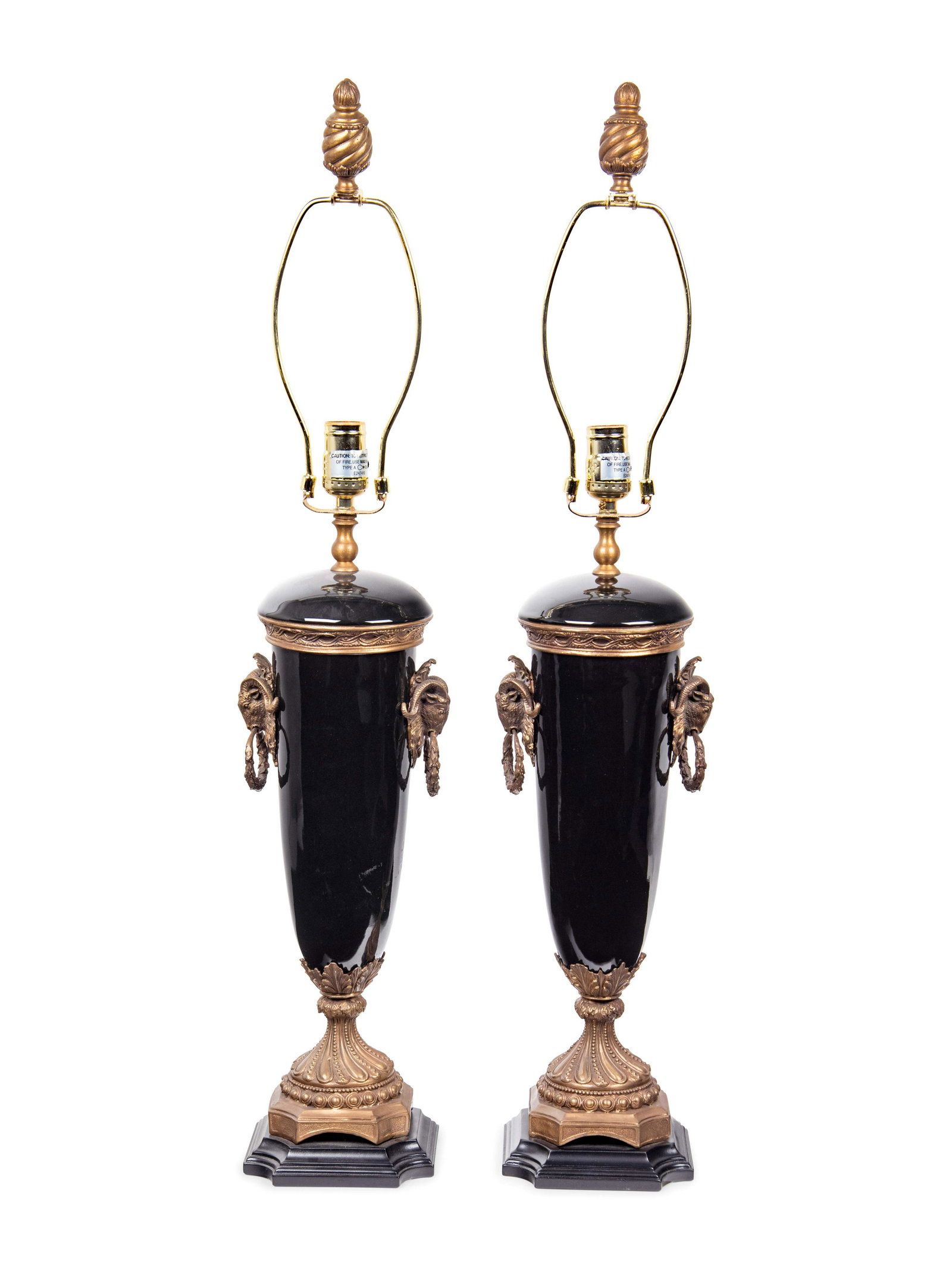 A Pair of French Gilt Bronze and Glazed Ceramic Urns: A Pair of French Gilt Bronze and Glazed Ceramic Urns Mounted as Lamps Late 19th Century Height overall 32 inches. Property from the Estate of Norma and David McIntyre, Los Angeles, California Note: Th