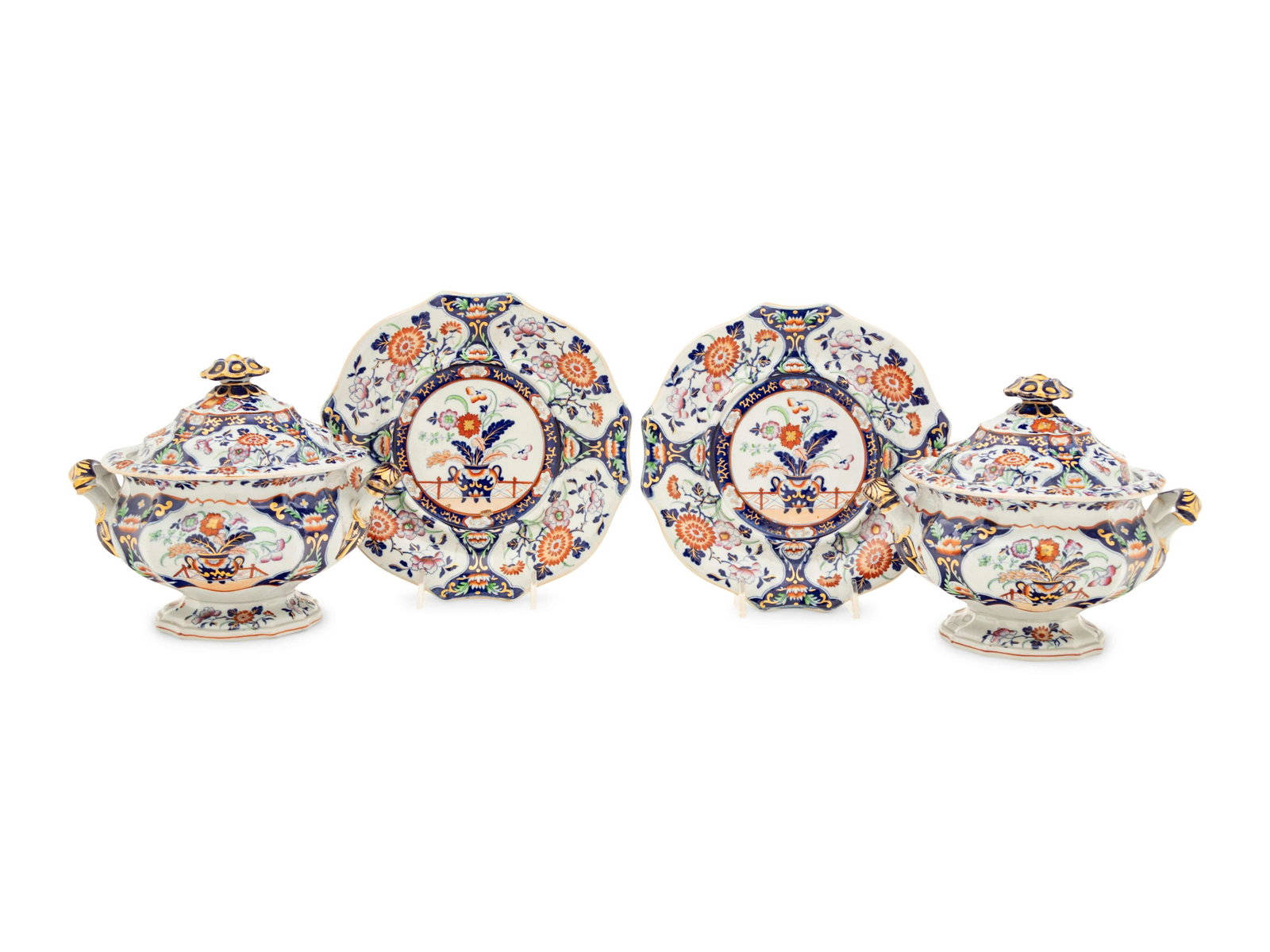 A Pair of English Ironstone Sauce Tureens: A Pair of English Ironstone Sauce Tureens 19th Century with Real Stone China stamp to the underside of each tureen and underplate. Width 7 1/4 inches. Property from the Estate of Norma and David McInt