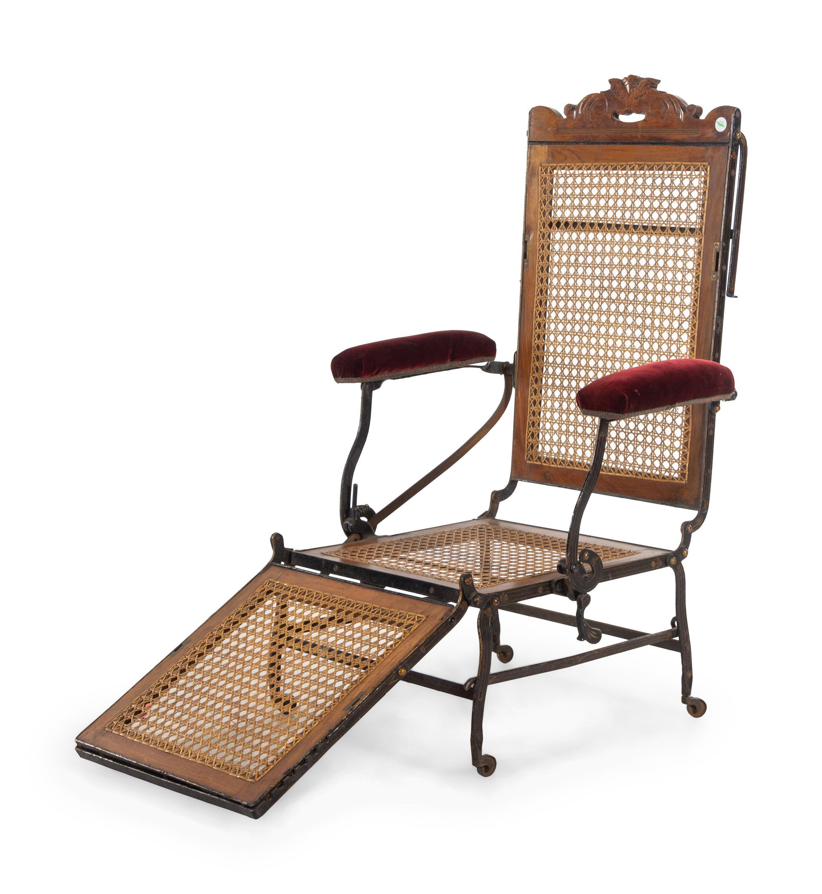 An American Walnut and Cast Iron Adjustable Invalid's: An American Walnut and Cast Iron Adjustable Invalid's Chair after a Design by Cevedra B. Sheldon Late 19th/Early 20th Century Height 46 3/4 x width 28 1/2 inches. Property from Christa's Ltd., Chicago