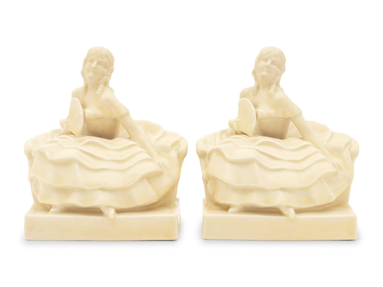 A Pair of Rookwood Pottery Bookends: A Pair of Rookwood Pottery Bookends 20th Century each with impressed Rookwood Pottery mark to the underside and artist mark to the base. Height 7 inches. Property from the Estate of Norma and David Mc