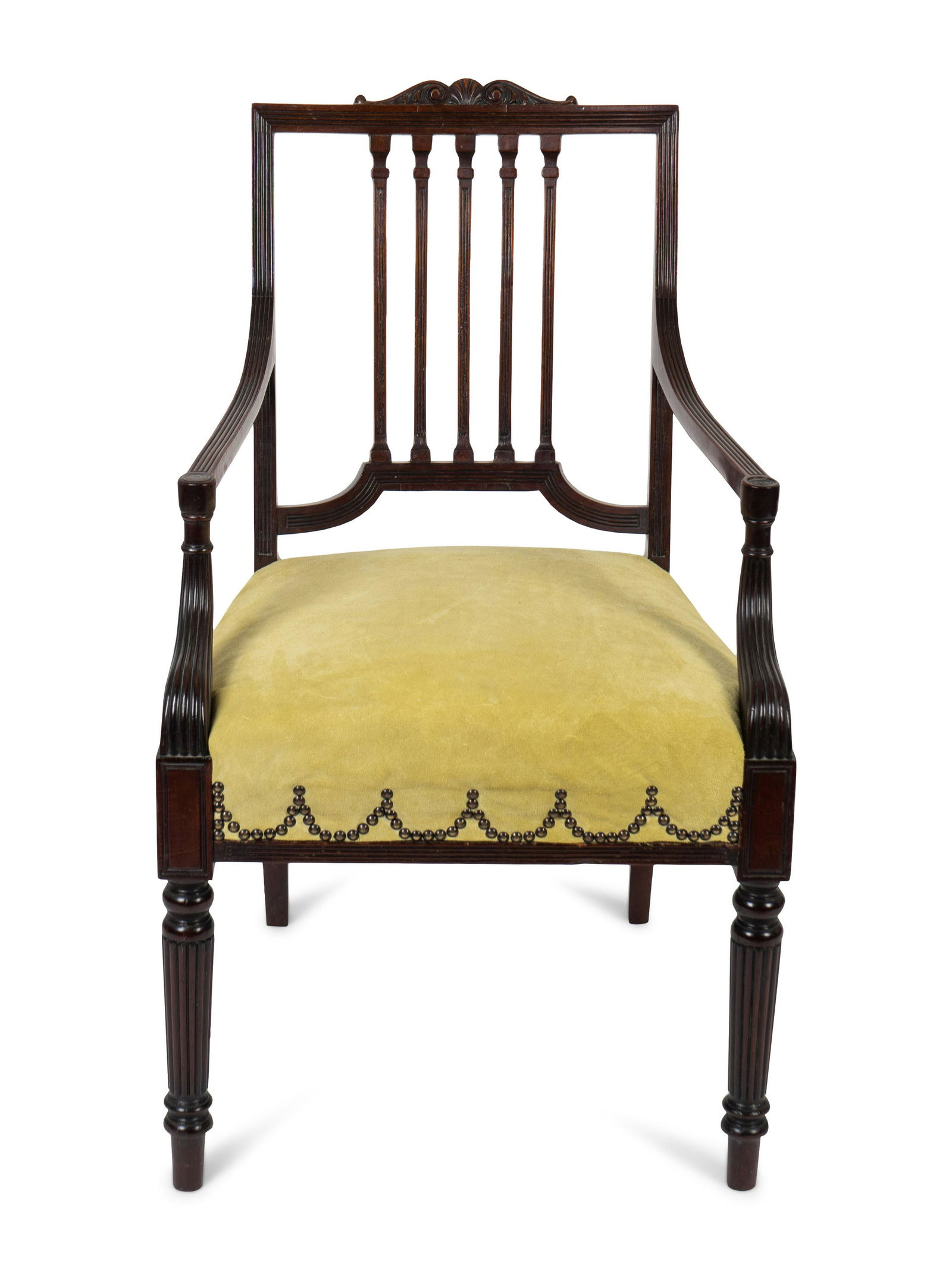 A Regency Mahogany Open Armchair in the Manner of: A Regency Mahogany Open Armchair in the Manner of Mayhew & Ince 20th Century Height 36 x width 21 3/4 x depth 22 inches. Property from the Collection of Bruce McCashin, Vero Beach, Florida Note: This