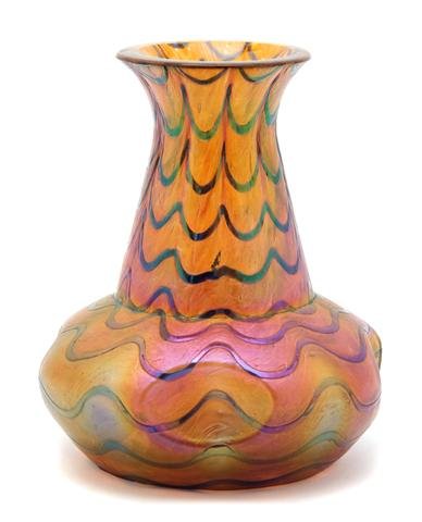 A Loetz Iridescent Glass Vase, Height 4 1/2 inches.: A Loetz Iridescent Glass Vase, of bottle form, with rippled finish, signed Loetz Austria. Height 4 1/2 inches. Property of a Private Southeast Michigan Collector