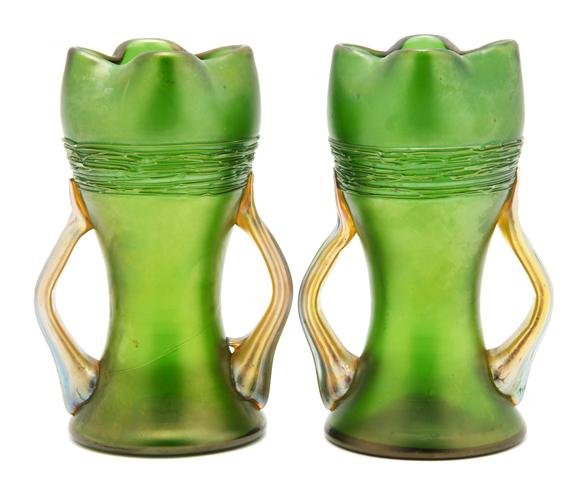 A Pair of Loetz Iridescent Glass Vases, Height 6 inches: A Pair of Loetz Iridescent Glass Vases, having applied handles and stringing, each engraved Loetz Austria. Height 6 inches. Property of a Private Southeast Michigan Collector