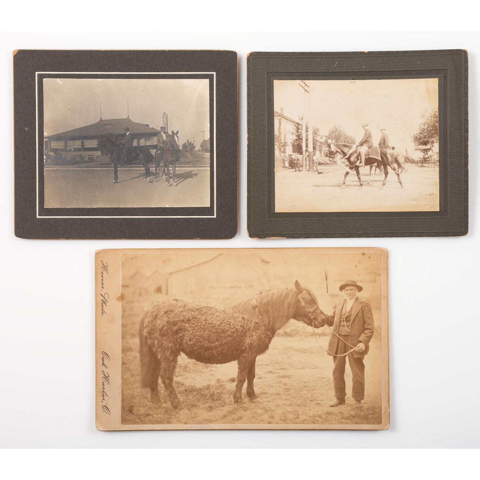 [EARLY PHOTOGRAPHY]. A group of photographs featuring: [EARLY PHOTOGRAPHY]. A group of photographs featuring cities, interiors, and landscapes, comprising: Lot of 100 images, many sizes, styles, ages(1) Boudoir card of a man holding the reins of a p