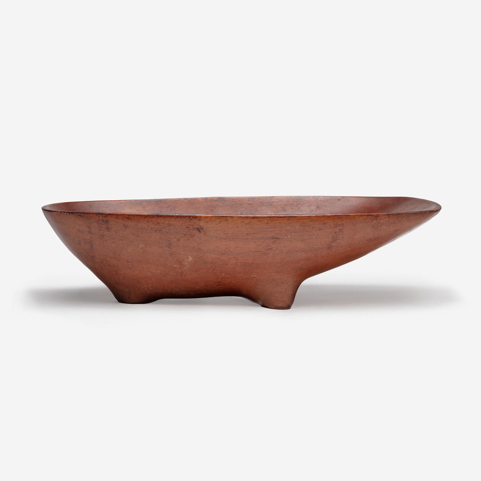 Emil Milan (American, 1922-1985) Carved Footed Bowl,: Emil Milan (American, 1922-1985) Carved Footed Bowl, Honduras/USA, circa 1964 BissilonIncised signature to underside: "Emilan/ Bissilon" (H: 4 1/2, W: 9 1/2, L: 18 in.)Qty: (1)Condition report: overa