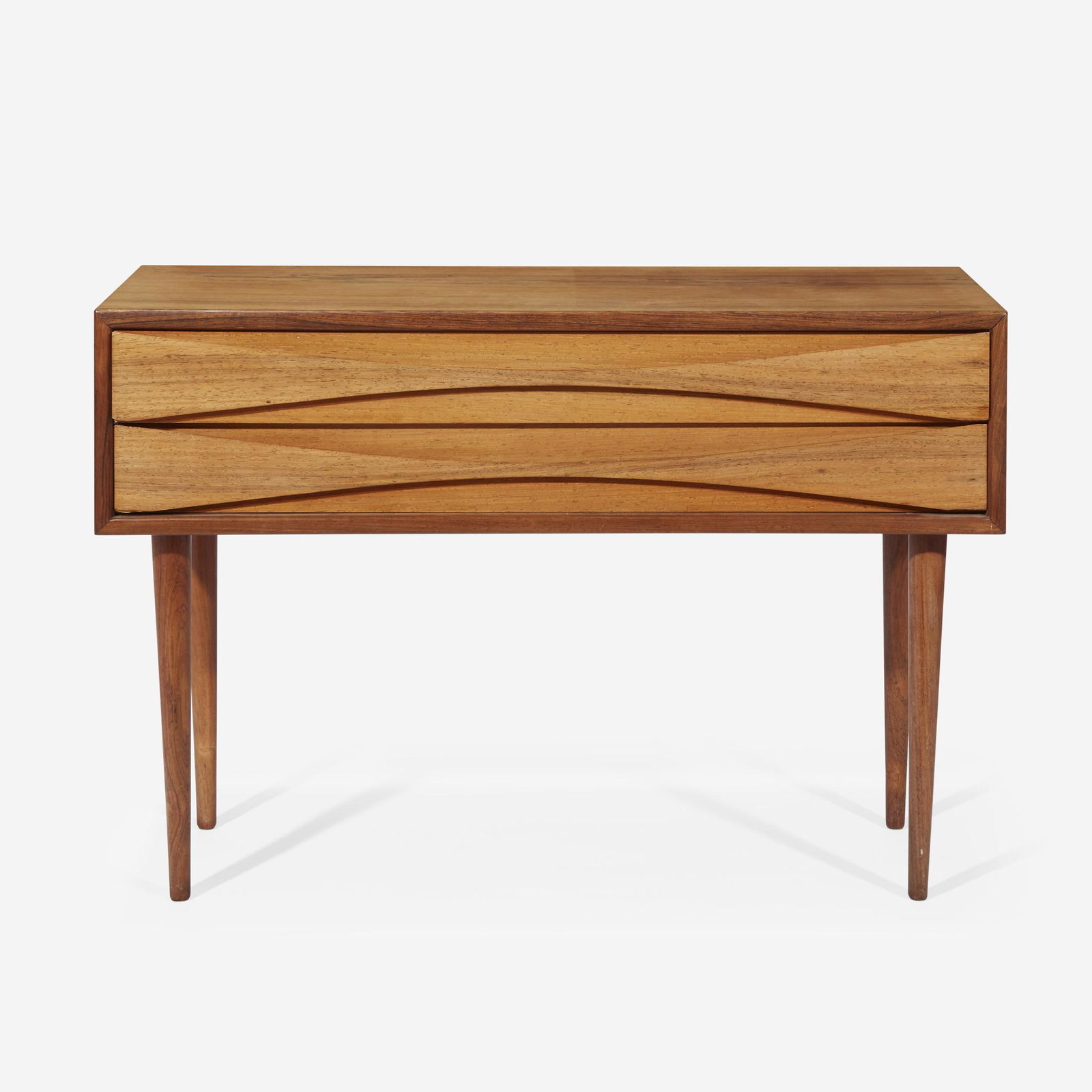Arne Vodder (Danish, 1926-2009) Two-Drawer Table, NC: Arne Vodder (Danish, 1926-2009) Two-Drawer Table, NC Möbler, Denmark, circa 1950s* Rosewood. (H: 21, W: 32, D: 12 1/2 in.) Provenance Property from a Private Philadelphia Collection.