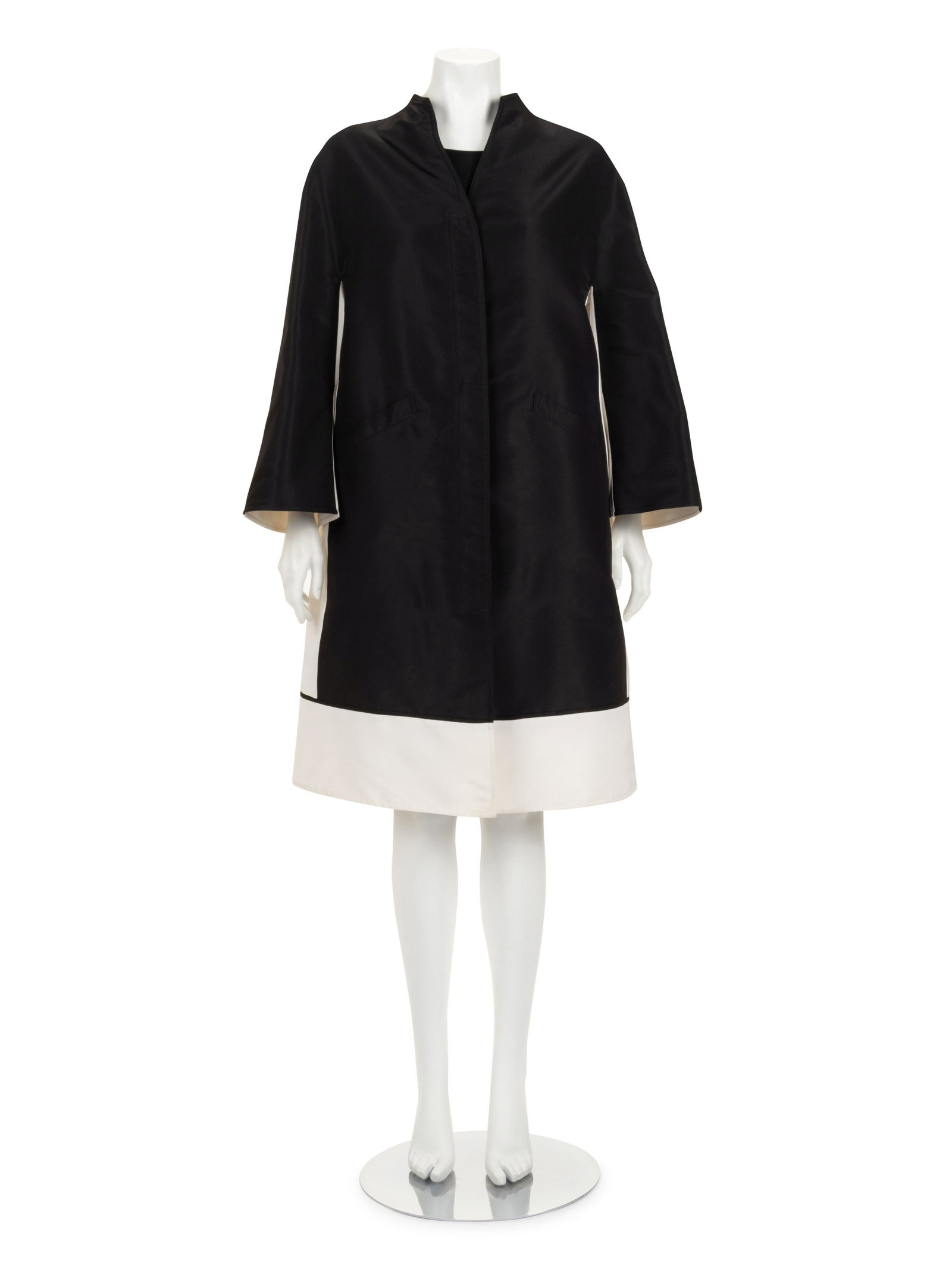 Ralph Rucci Silk Taffeta Color Block Mod Coat: Ralph Rucci Silk Taffeta Color Block Mod Coat Black and white color block silk taffeta mod coat with funnel style collar, pieced raglan style flared sleeves, front welted hip pockets, and hidden cente