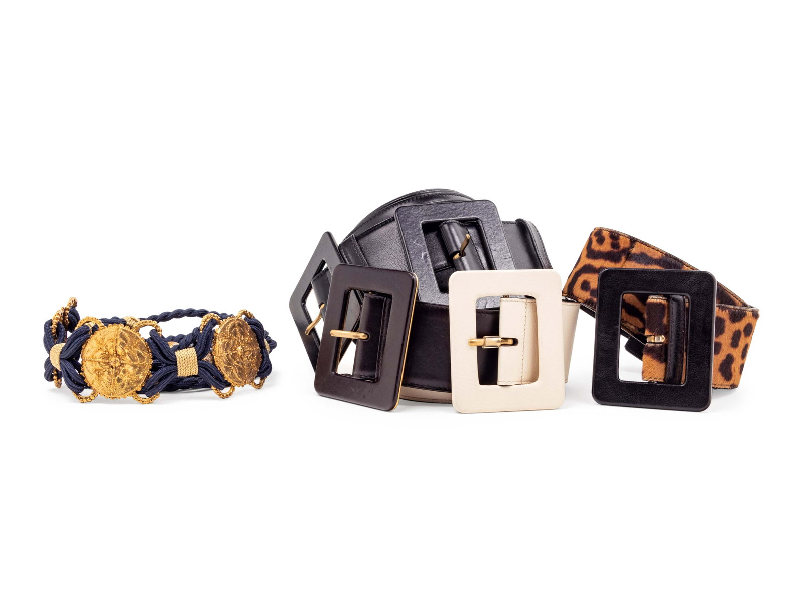 Six Yves Saint Laurent Belts: One Cord and Five Leather: Six Yves Saint Laurent Belts: One Cord and Five Leather This lot includes six belts. THE FIRST Navy braided cord belt with beading and tassel detail at either end and gold-tone medallions at center fr