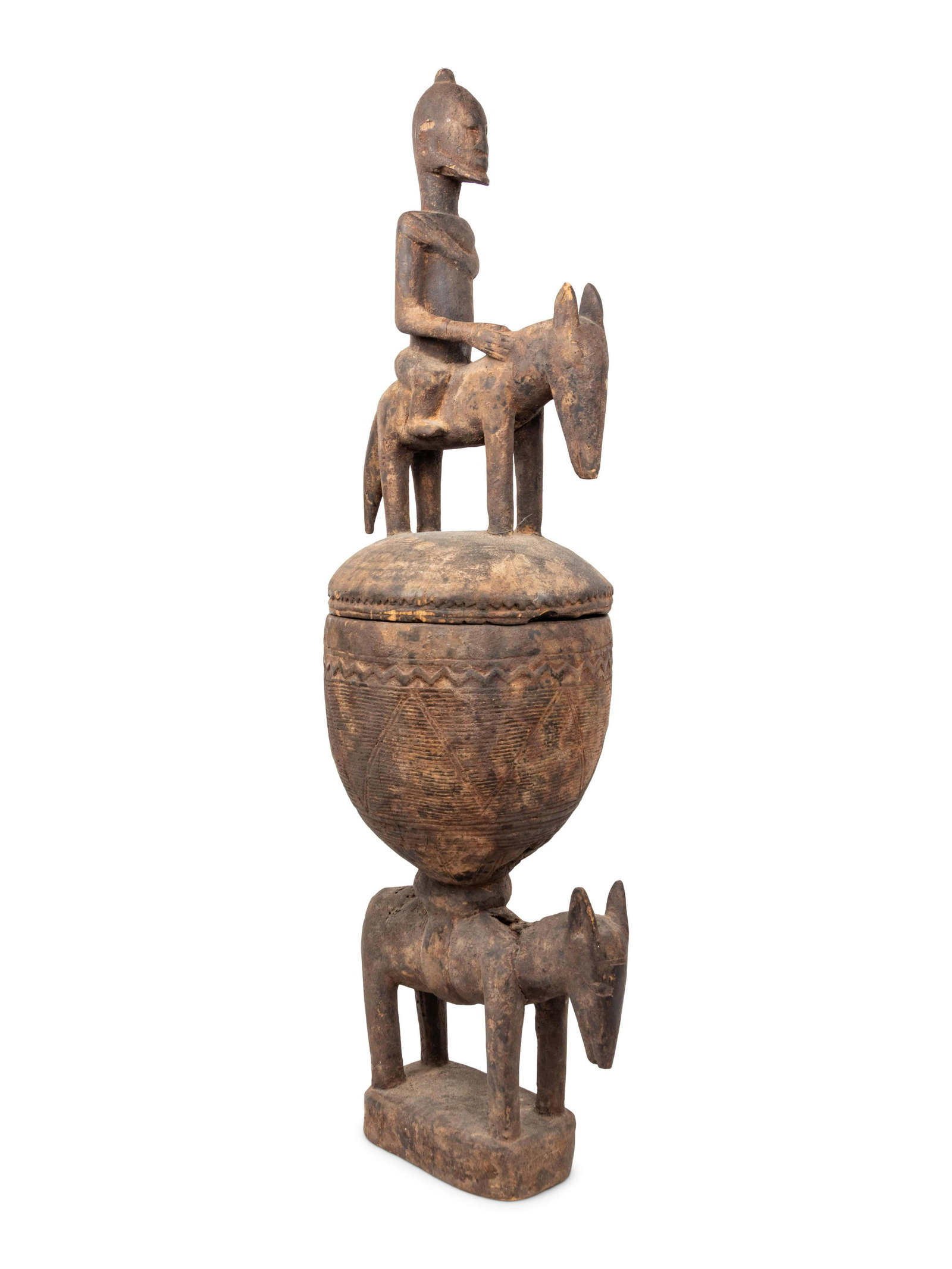 A Dogon Carved Figural Offering Bowl: A Dogon Carved Figural Offering Bowl West Africa, Mid 20th Century Height 43 1/2 inches. Property from the Collection of Stephen and Katherine Harrison, Chicago, Illinois Provenance: Douglas Dawson Ga