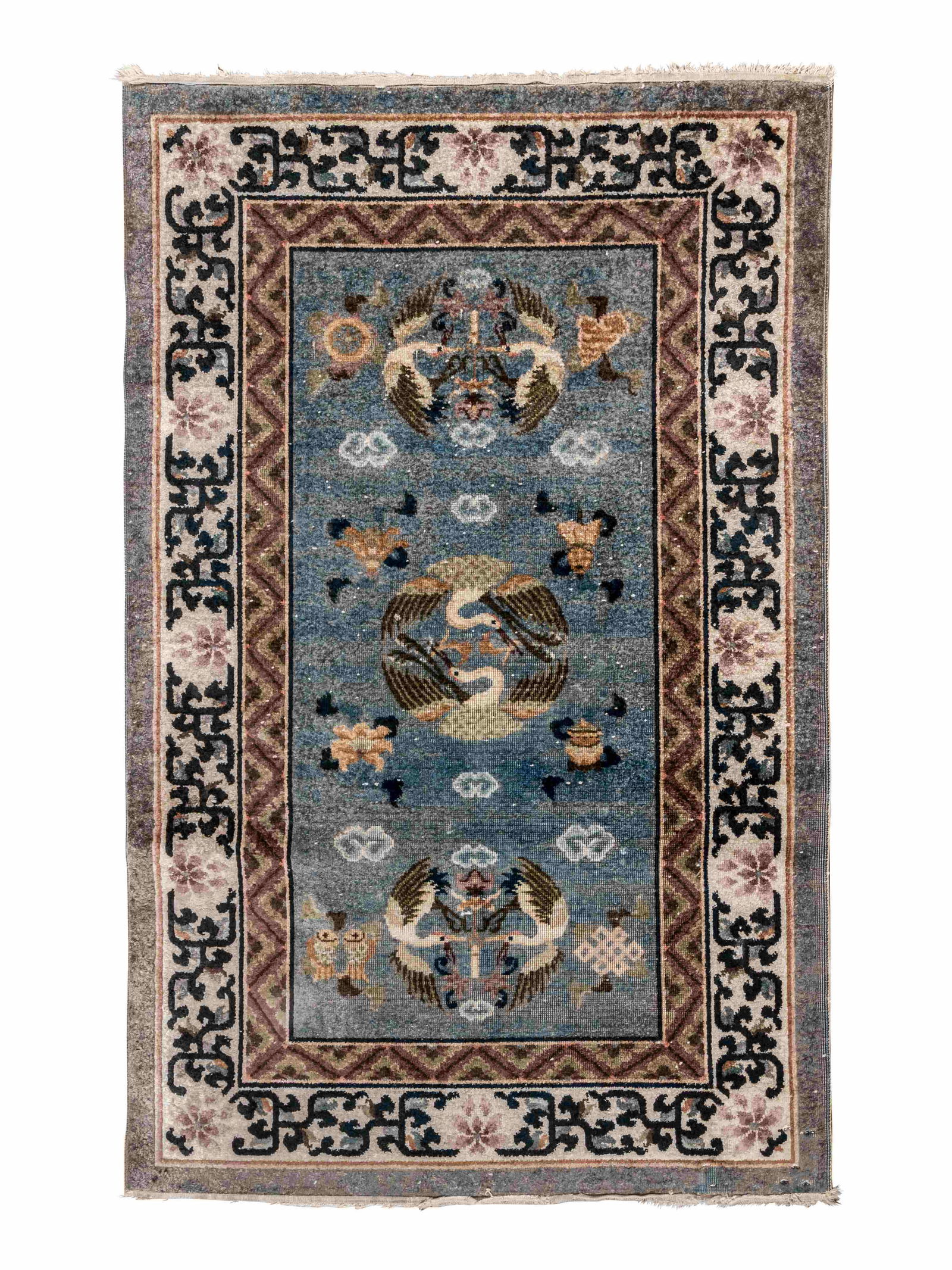 A Chinese Wool Rug: A Chinese Wool Rug 4 feet 10 inches x 3 feet. Property from the Private Collection of a Gentleman, Chicago, Illinois