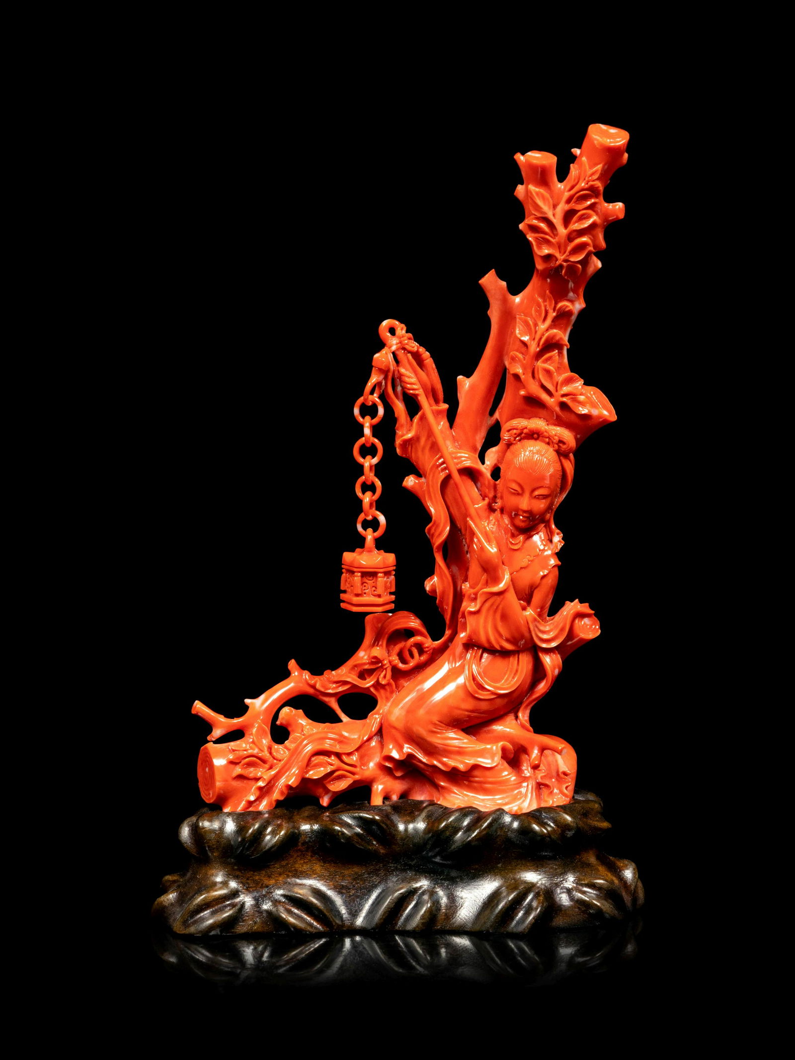 A Carved Red Coral Figure of a Female Immortal (1 of 3)