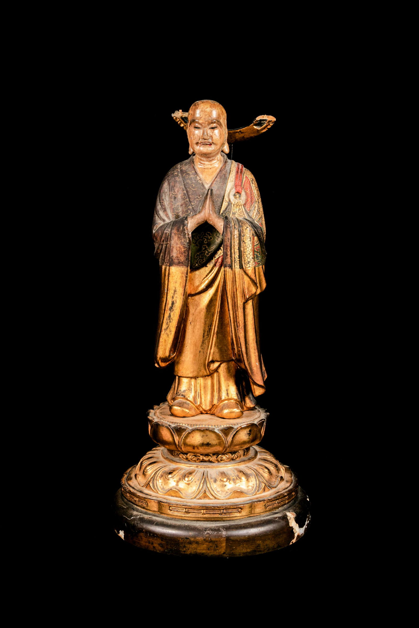 A Polychrome and Gilt Painted Wood Figure of a Standing (1 of 3)