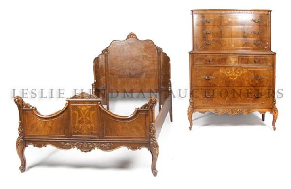 A Louis XVI Style Marquetry Bedroom Suite, Height of fi: A Louis XVI Style Marquetry Bedroom Suite, comprising a tall chest, a long chest a dressing table, a nightstand and a bed. Height of first 52 1/2 x width 28 x depth 20 inches. Property from the Collec