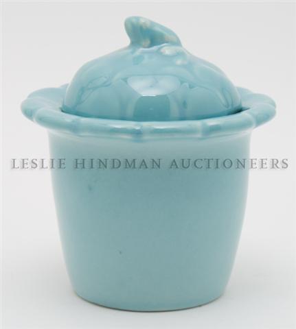 A Rookwood Pottery Covered Vessel, Height 4 3/4 inches.: A Rookwood Pottery Covered Vessel, of tapering form, having a scalloped rim with allover blue glaze, impressed with Rookwood mark and 7002. Height 4 3/4 inches.