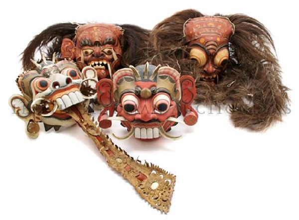 A Group of Four Balinese Masks, Height 9 1/2 inches.: A Group of Four Balinese Masks, each with polychrome decoration, two having applied hair. Height 9 1/2 inches.