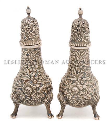 A Pair of American Sterling Silver Casters, S. Kirk, He: A Pair of American Sterling Silver Casters, S. Kirk, in the Repousse pattern. Height 4 1/2 inches.