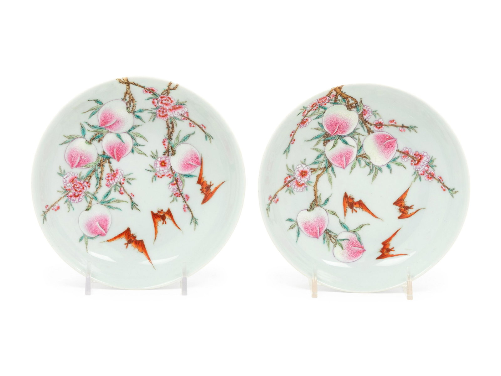A Pair of Chinese Famille Rose Porcelain 'Bats and: A Pair of Chinese Famille Rose Porcelain 'Bats and Peaches' Dishes EARLY REPUBLIC PERIOD each of circular form with gently sloping walls, painted to the interior with bats soaring amidst fruiting peac