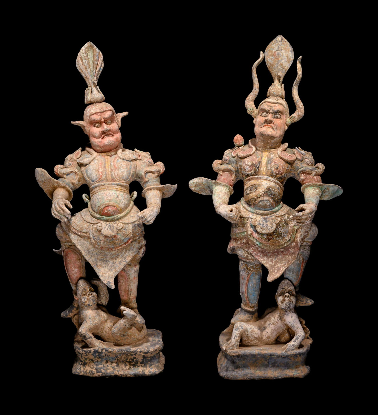 A Pair of Chinese Painted Pottery Figures of Guardians (1 of 5)