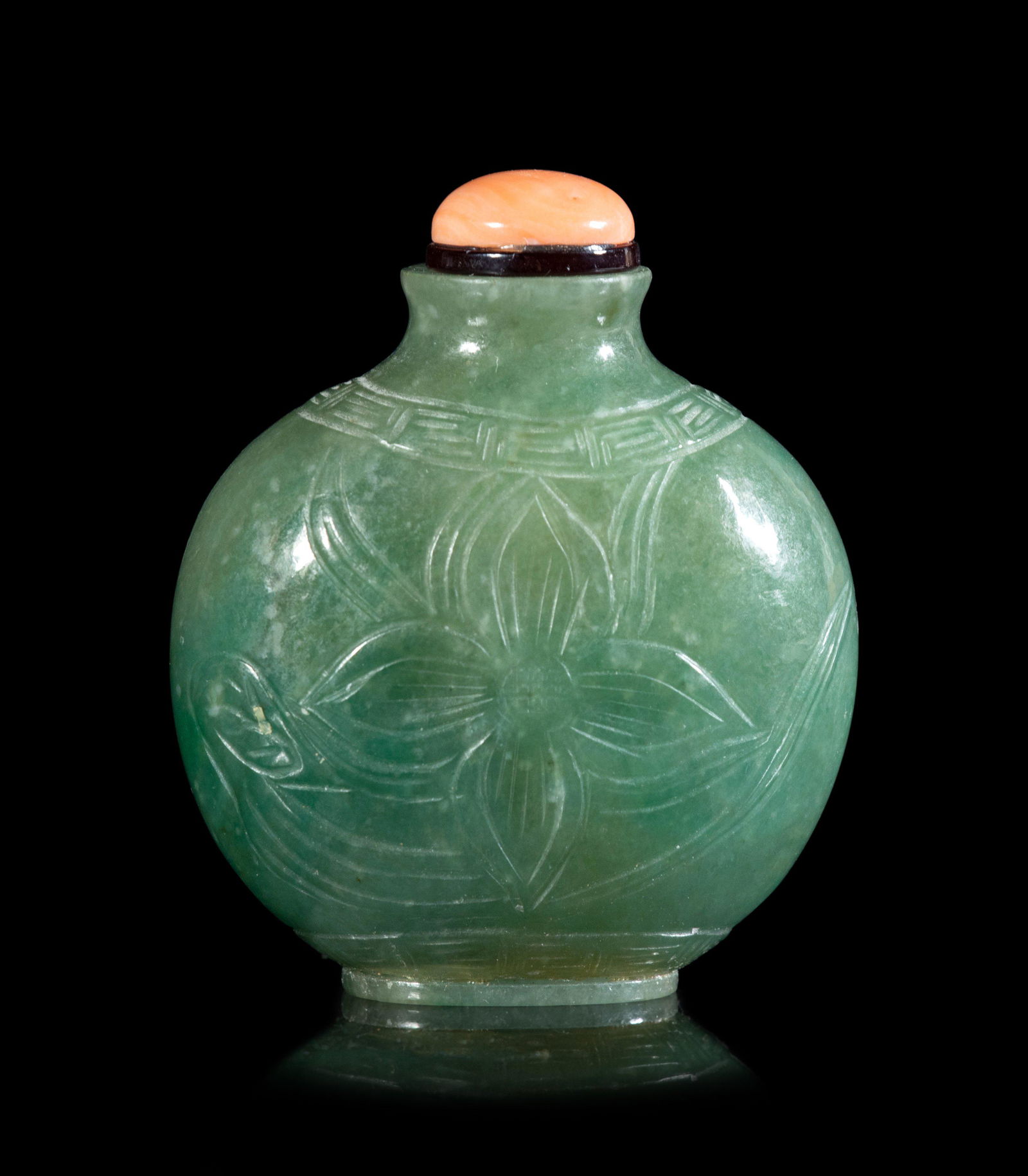 A Chinese Carved Jadeite Snuff Bottle (1 of 2)