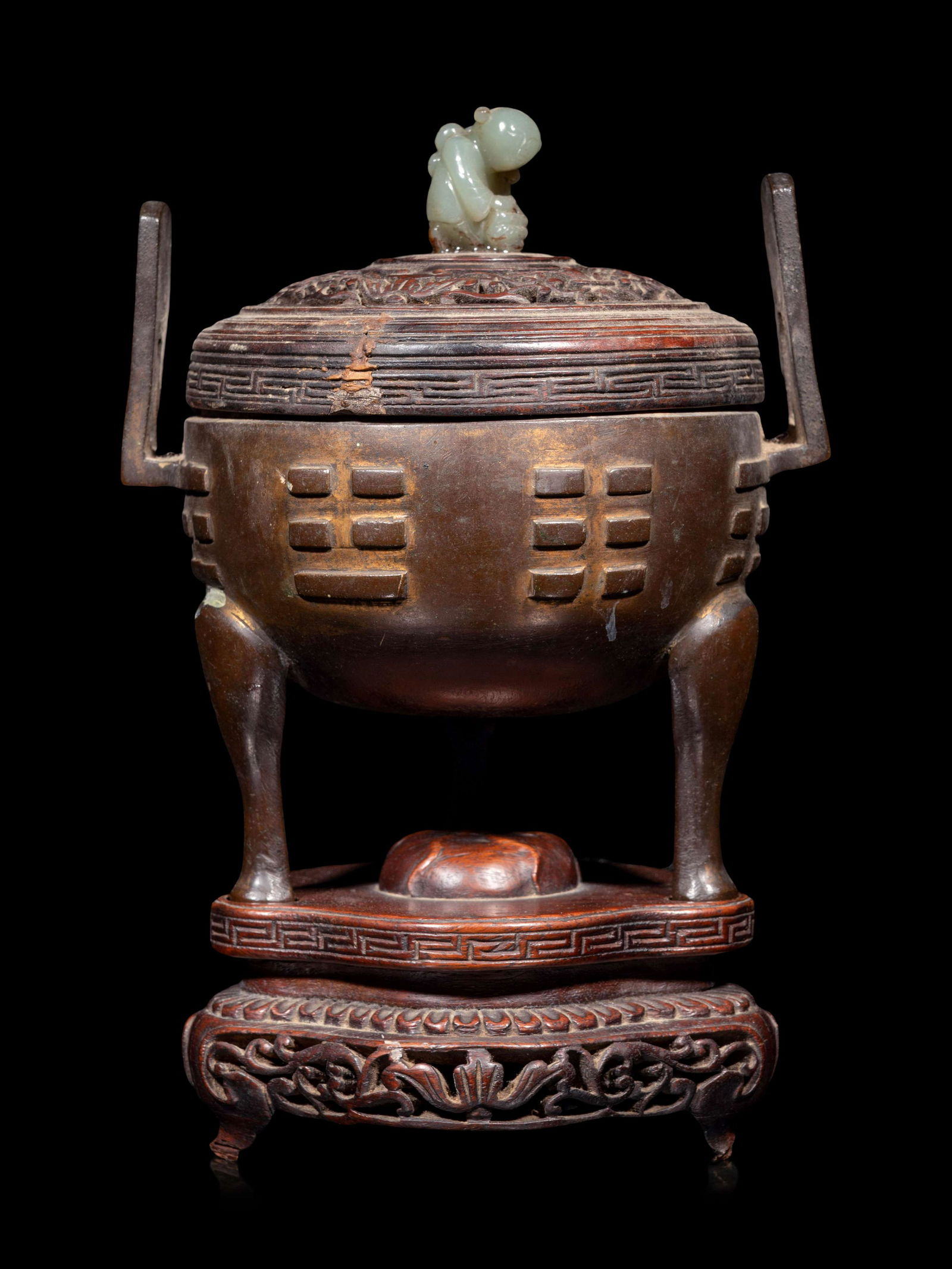 A Chinese Cast Bronze Tripod Incense Burner (1 of 4)