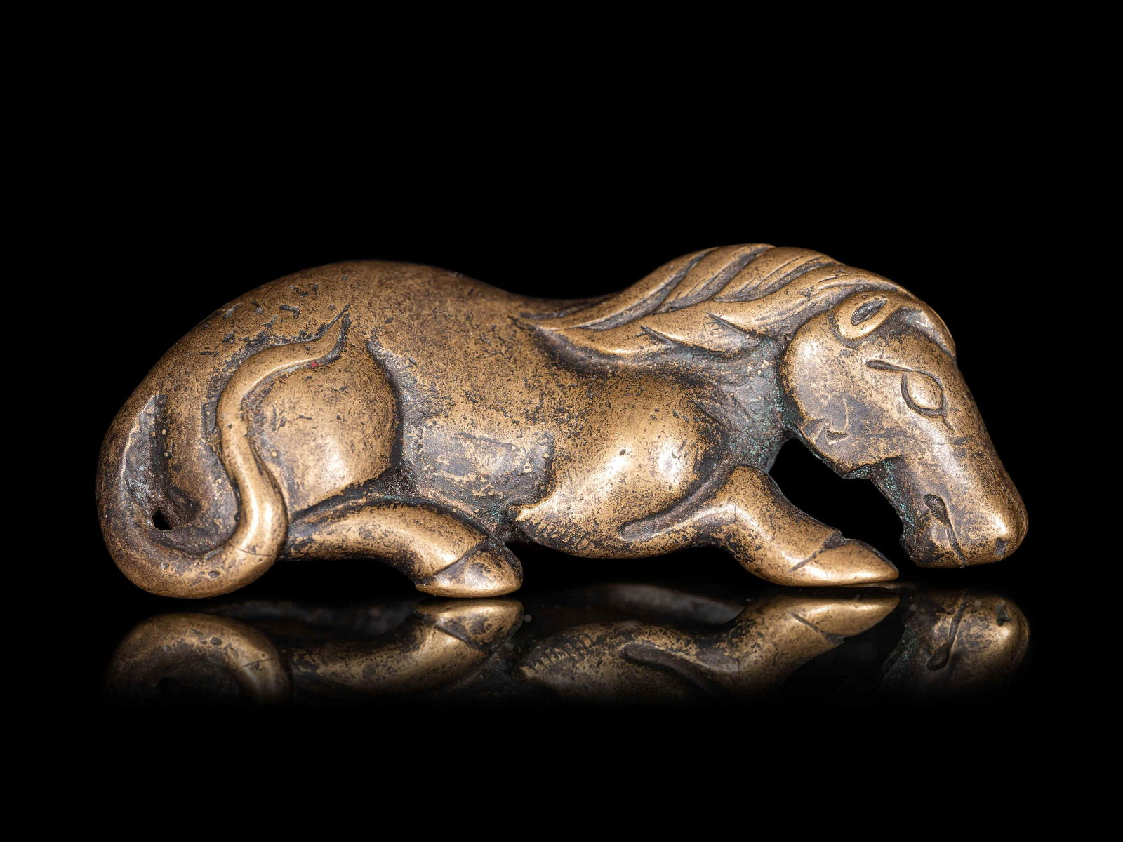 A Chinese Gilt Bronze Figure of a Recumbent Horse (1 of 2)