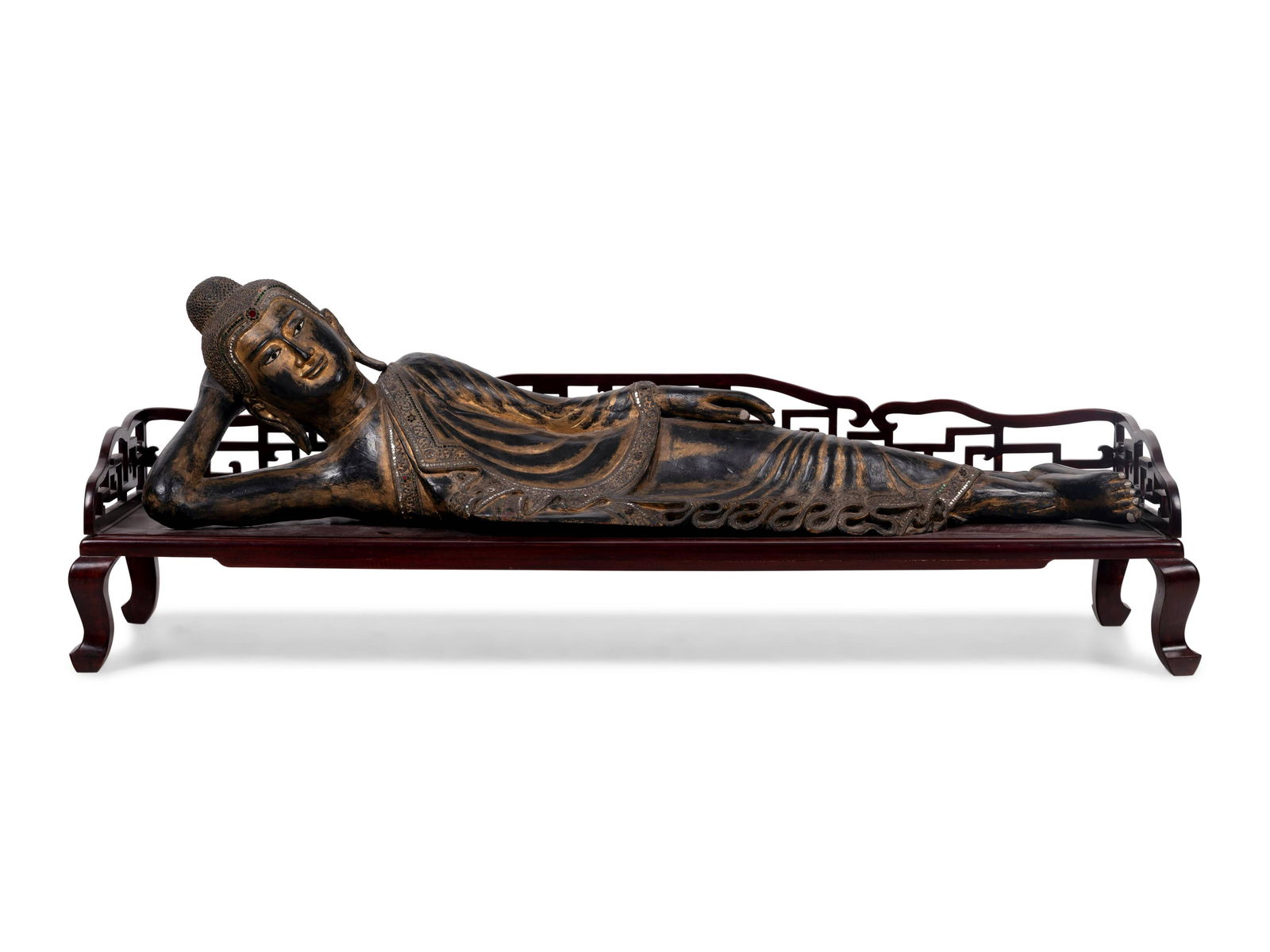 A Thai Gilt Decorated Black Lacquered Wood Figure of (1 of 5)