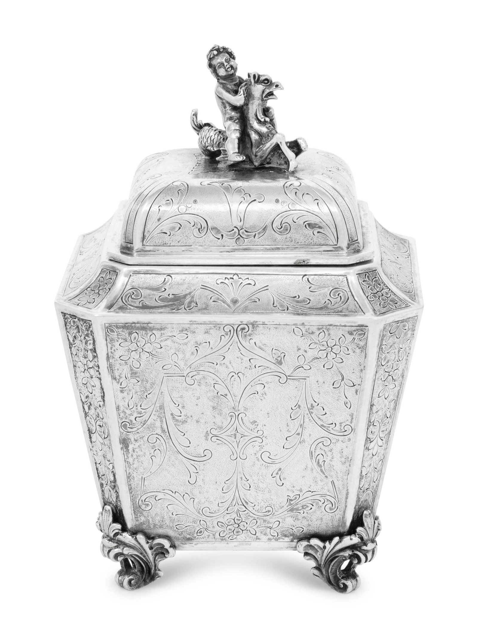 An Italian Silver Tea Caddy: An Italian Silver Tea Caddy First Half 20th Century raised on four foliate feet. marked '800' on underside 16 ozt 14 dwt Height 6 1/4 inches. Property from the Estate of Patricia Ann Black Smyth, Sant