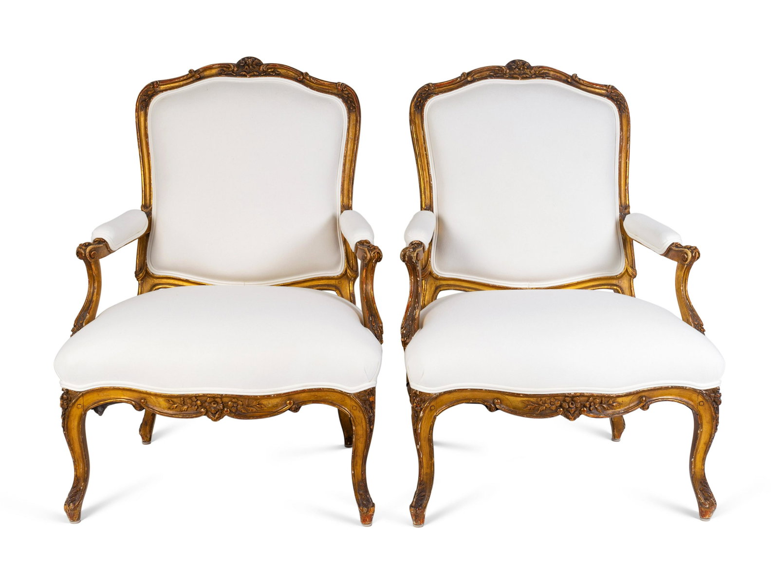 A Pair of Louis XV Giltwood Bergeres Height 42 x width: A Pair of Louis XV Giltwood Bergeres LATE 18TH CENTURY Height 42 x width 30 x depth 27 inches. Property from a Gentleman, Palm Beach, FL