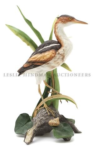 A Boehm Model of a Least Bittern, Height 15 1/4 inches.: A Boehm Model of a Least Bittern, modeled standing near cattails with a snail by his feet. Height 15 1/4 inches. Property from the Estate of Anne Scholl, Indian Wells, California