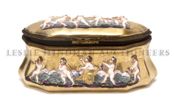 A Capodimonte Gilt Metal Mounted Box, Width 5 inches.: A Capodimonte Gilt Metal Mounted Box, having a hinged lid and decorated with bands of putti on a gilt ground, having crowned N mark in underglaze blue. Width 5 inches.