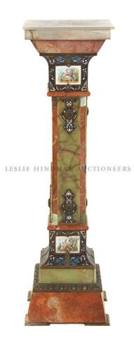 A Continental Onyx, Champleve and Porcelain Inset Pedes: A Continental Onyx, Champleve and Porcelain Inset Pedestal, having square top over enamel framed panels depicting courting couples, raised on a stepped base. Height 44 inches. Property from the Collec