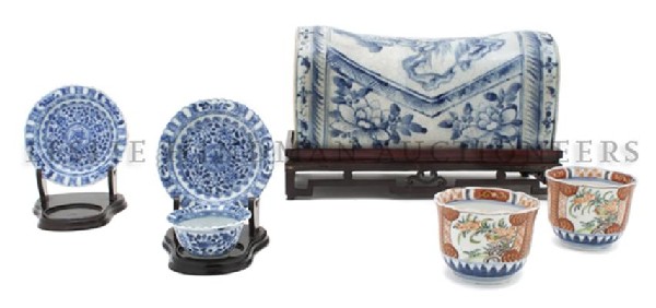A Collection of Southeast Asian Porcelain Articles: A Collection of Southeast Asian Porcelain Articles, comprised of a blue and white head rest, a blue and white teacup and two saucers, two famille rose plates and two imari tea bowls. Width 11 3/4 inch